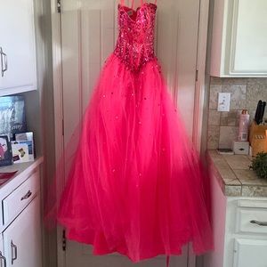Pink Dress. WEAR UNDER THE TULE FROM TOUCHING FLOOR. SHOULD GO AFTER CLEANING.